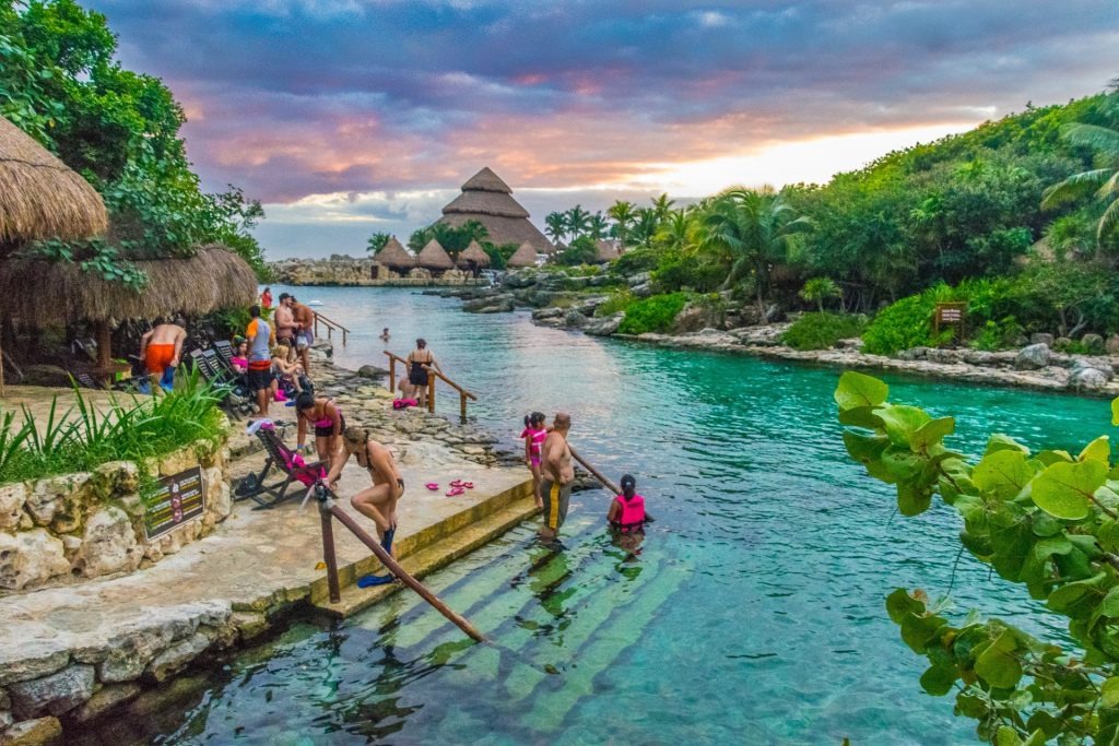 Turquoise lagoon and underground river inside Xcaret Park